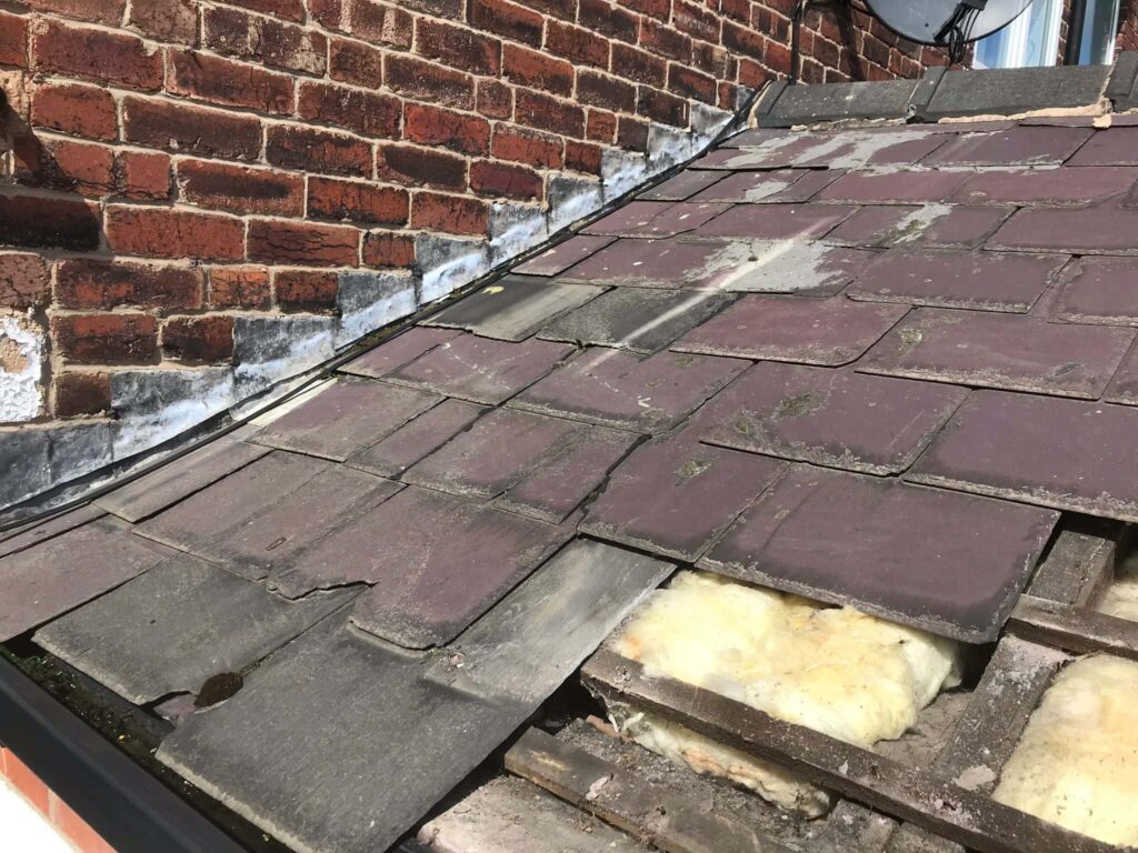 This is a photo of an old small pitched roof which is being stripped by EF Roofing Doncaster