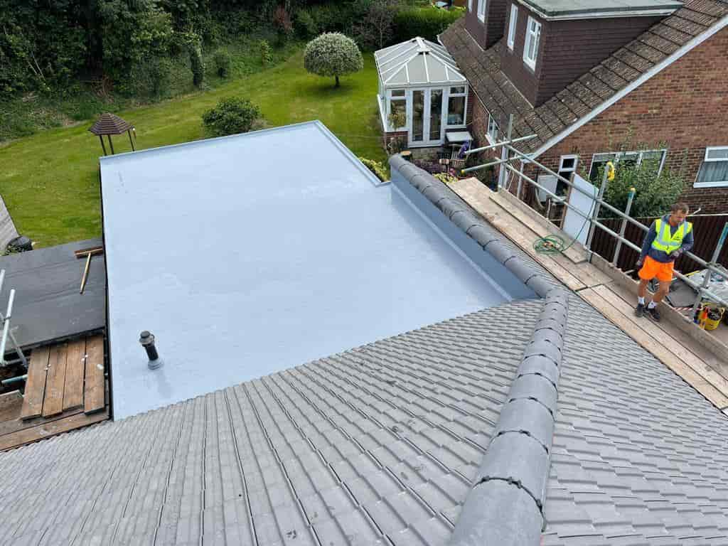 This is a photo of a hip roof with an extension that has a flat roof covered in a liquid roof solution by EF Roofing Doncaster