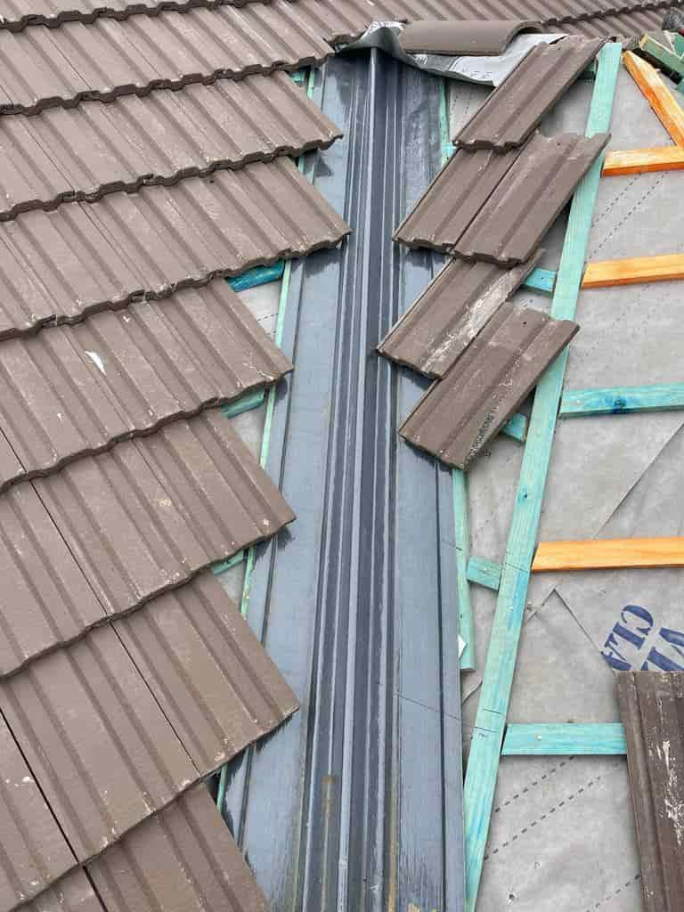 this is a photo of roof tiles being installed by the edge of a roof valley by EF Roofing Doncaster