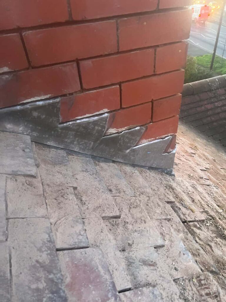 This is a photo of newly installed lead flashing around a chimney stack by EF Roofing Doncaster